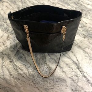 Michael Kors black purse.